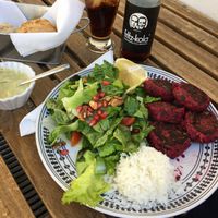 Red beet falafel with fresh salad. (And tasty buns with hummus for starters.) at Inga's Veggie Heaven in Nicosia