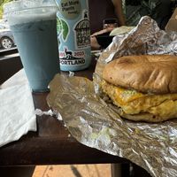 Steak egg and cheese bagel with blue lagoon drink  at Hue Cafe & Apothecary in Owings Mills