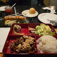Bbq pork buns, spicy tuna sushi, and crispy beef bento box. at Chef Kenny's Vegan Dim Sum in Las Vegas