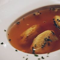 Klare Tomatenessenz mit Polentanocken at Gasthaus Bürgerstüble in Sankt Peter