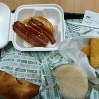 Pancakes with bacon, breakfast bagel & muffin. at Vegan Shack - Piccadilly Gardens in Manchester