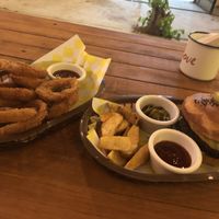 Mmmmmmm burger & onion rings   at Crush in Merida