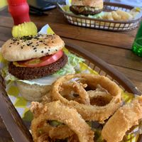 Lentil burger and onion rings 😍  at Crush in Merida