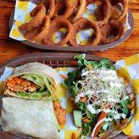 Wrap and onion rings. at Crush in Merida