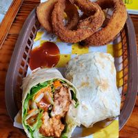 Wrap comes with rings, potatoes or salad. at Crush in Merida
