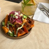Tempeh salad and elderflower cocktail (both very yummy) at Vegan Food Tour Utrecht in Utrecht