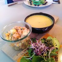 The delicious platter with salmon sandwich, corn soup and sweet potato salad at First Eet in Arnhem