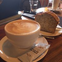 Cafe latte & homemade lemon poppyseed cake at First Eet in Arnhem