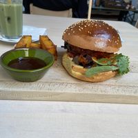 Korean burger with polenta sticks: tasty with a thick patty, but more spicy than I thought. Not only the kimchi but also the sticks and the sauces are spicy.  at First Eet in Arnhem