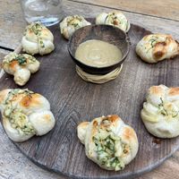 Garlic Knots with Ranch Sauce  at Pizza Papi in Tulum