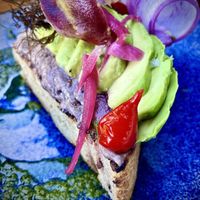 Avocado, toast .   at Castro's in Honolulu