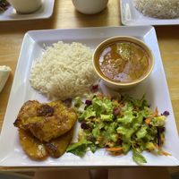 Rice, beans, salad with an AMAZING dressing, and plantains   at Café MAM in Carolina