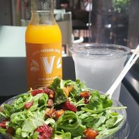 Local garden salad & OJ at SoBe Vegan in Miami Beach