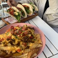 Loaded fries and avocado tacos   at SoBe Vegan in Miami Beach