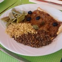 Pissaladière (onion pie) and hot vegetables and cereal at Le Tournesol Cuisine Vegetarienne in Albi