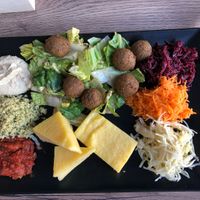 Falafel plate with vegan polenta and sides  at Le Tournesol Cuisine Vegetarienne in Albi