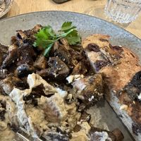 Za’atar and hummus mushrooms with olive bread   at Mr Burch in Mckinnon