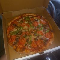 Mushroom, bell pepper and tomato. Made in 15 minutes flat. So pretty! Tastes great! at The Village Pizzeria in Dresser