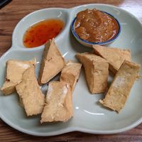 Fried tofu with satay sauce and sweet chili sauce at Thai On The Island in Cowes