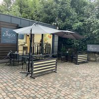 Exterior. Located at the end of a street with small restaurants just before the tunnel under the train tracks   at Zingy smaki Mauritiusa in Gdansk