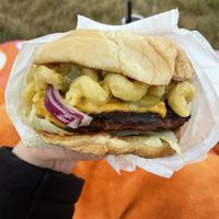 Classic burger with Mac and cheese on top  at Curbside Comforts in Gorham