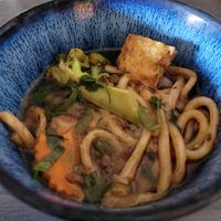 Banh Canh soup with Udon noodles, vegetables, mushrooms, and tofu at EatHappy Vegan in Oslo