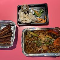My takeout: fried spicy udon, crystal dumplings, soy steak  at EatHappy Vegan in Oslo