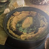 Hummus platter with ajo rostizado  at El Armadillo Mazunte in Mazunte