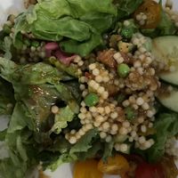 Tomato cous cous salad. Amazing flavor!   at Bare Bones in La Porte