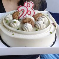 Lotus-pistachio-coconut birthday cake  at Tom Itzhaki in Tel Aviv