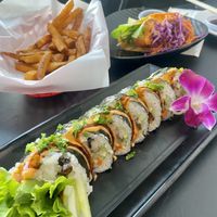 I think the veggie roll with fish taco behind at Vegan Castle in Long Beach