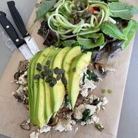 Scrambled Tofu Toasts with mushrooms, avocado and salad 😍🤤 at Bakery Kafeneio in Limassol