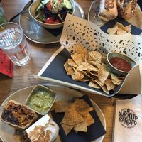 planted and veggie burrito with salad and tortilla chips  at Florian Caffè in Bern