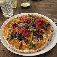 Sunset Pizza with pumpkin, beet root and pesto  at Froindlichst in Berlin