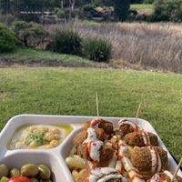 felafel snack pack in the park across the road from the van  at Wazzup Falafel in Preston