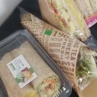 Packaged sandwiches and rolls for takeout at Loving Hut 愛家 in Jian