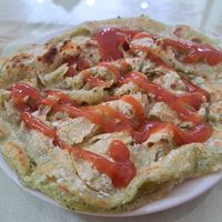 Zhuabing 抓餅 (flaky savoury pancake) at Loving Hut 愛家 in Jian