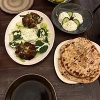 pita bread, couscous, potato puffer and tzatziki   at Apostel's in Munich
