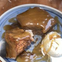 Sticky toffee pudding and ice cream  at Goddard Arms in Swindon