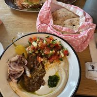 Hummus with pita  at NENI in Vienna