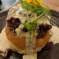 Haggis with root mash, whisky tarragon cream at Hendersons in Edinburgh