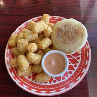 Sausage, Egg, Cheese muffin with a side of Tots!  at Sweet Hazel & Co Grab & Go in Salt Lake City