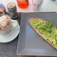 Cappuccino & avocado toast  at Café Luca Restaurante in Coimbra