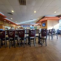 Large dining room at Mr. Hui's Peacock Express in Florence