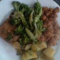 Sweet and sour soy meat bites, brocoli, steamed potatoes and sautee ham at Loving Hut in Panama City