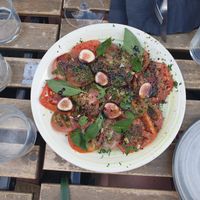 Tomatos seasoned to perfection with choves, salt, pepper, balsamic vinager plus figs! 🍅 at Nicolo' My Kitchen Way in Biarritz