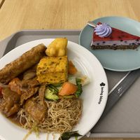 food from buffet and panna cotta cake  at Loving Hut - Vinohrady in Prague