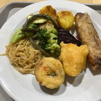 Deep fried sushi amongst other lukewarm food.   at Loving Hut - Vinohrady in Prague