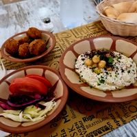 Hummus plate with felafeln and salad at Atomic Falafel in Florence