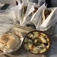 panini falafel e hummus con pita da dividere, buonissimo!  at Atomic Falafel in Florence